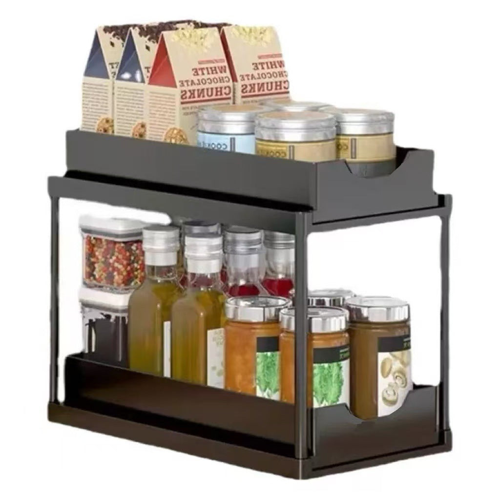 BLACK Two-tier pull-out storage rack. An organizational lifesaver for under the kitchen sink. Features adjustable shelves for easy storage of bottles and jars. In a sleek, modern design. Perfect as a kitchen shelf, bathroom organizer, or household storage