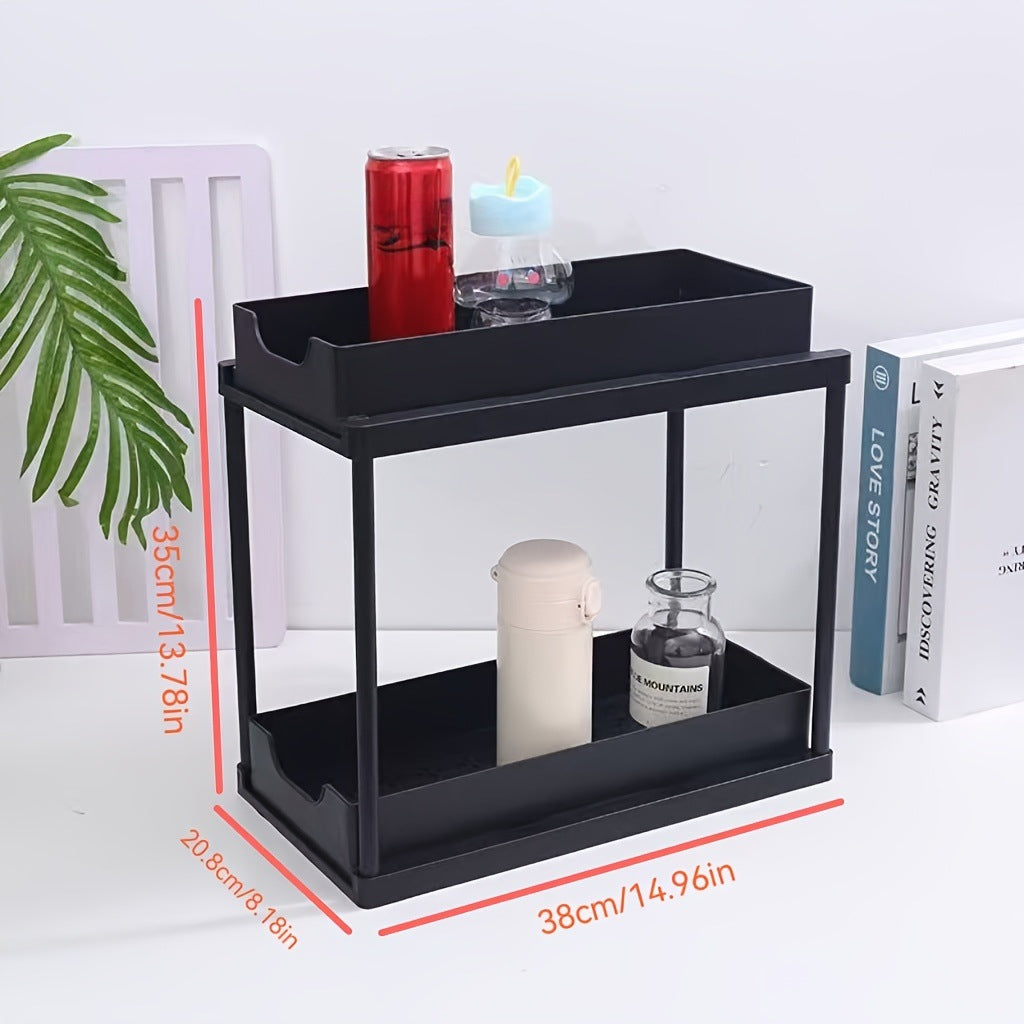 BLACK Two-tier pull-out storage rack. An organizational lifesaver for under the kitchen sink. Features adjustable shelves for easy storage of bottles and jars. In a sleek, modern design. Perfect as a kitchen shelf, bathroom organizer, or household storage