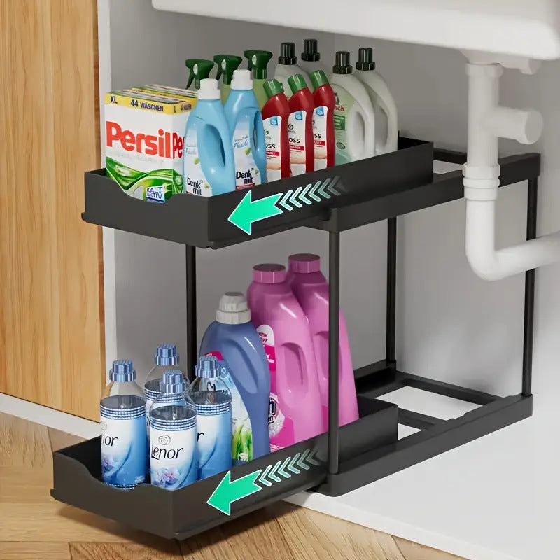Two-tier pull-out storage rack. An organizational lifesaver for under the kitchen sink. Features adjustable shelves for easy storage of bottles and jars. In a sleek, modern design. Perfect as a kitchen shelf, bathroom organizer, or household storage(WHITE